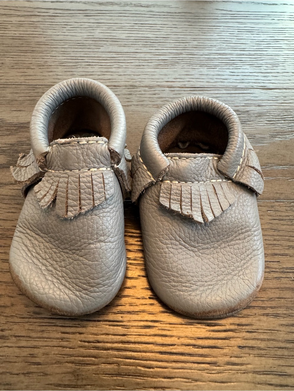 Freshly Picked Taupe Leather Fringe Baby Moccasins